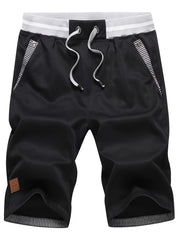 Eden | Knie-lange Shorts mit Kordelzug und Taschen – Schwarz