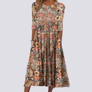 Lucie - Anmutiges langes Blumen-Kleid – Beige