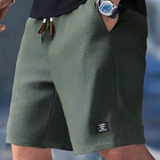 Zaniel - Vielseitige Shorts mit Kordelzug – Grün