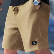 Zaniel - Vielseitige Shorts mit Kordelzug – Beige