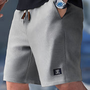 Zaniel - Vielseitige Shorts mit Kordelzug – Grau