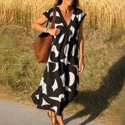 Tallisia - Midikleid mit V-Ausschnitt und weichem Griff – Schwarz