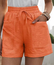 Daphne - Luftige Paperbag-Shorts – Orange