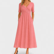 Elegantes Midikleid für Frauen - V-Ausschnitt, Ellbogenlange Ärmel, Praktische Taschen – Rosa