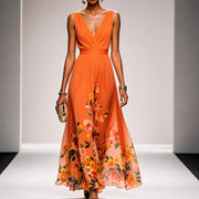 Tanisha - Langes Kleid mit Blütenmuster – Orange