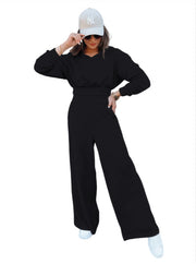 Damen Loungewear-Set mit Cropped V‑Ausschnitt-Pullover und hochtaillierter Palazzohose Nord Taschen – Schwarz