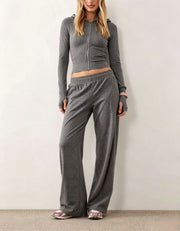 Damen Zweiteiliges Loungewear-Set geripptes Crop-Kapuzenoberteil mit Reißverschluss und Daumenloch sowie weiter Jogginghose Nord Taschen – Dunkelgrau