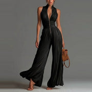 Elziora | Eleganter Plissee-Jumpsuit mit Blumenmuster – Schwarz