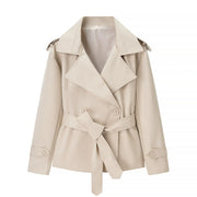 Damen Cropped-Trenchjacke mit doppelter Knopfleiste, Taillengürtel und Schulterriegeln Nord Taschen – Apricot