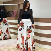 Damen Fließender Maxirock mit hoher Taille und großem Blumenprint Nord Taschen – Weiß-Schwarz Langarm