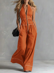 Damen Ärmelloser Halter-Jumpsuit mit Reißverschluss, weitem Bein und Eingrifftaschen Nord Taschen – Orange