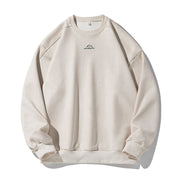 Unisex Oversize Rundhals-Sweatshirt mit minimalistischer Bergstickerei Nord Taschen – Sandgrau