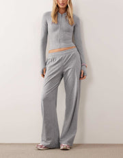 Damen Zweiteiliges Loungewear-Set geripptes Crop-Kapuzenoberteil mit Reißverschluss und Daumenloch sowie weiter Jogginghose Nord Taschen – Hellgrau