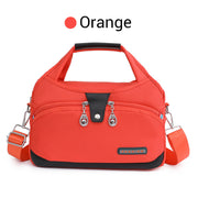Oella | Diebstahlsichere Handtasche mit 10 Fächern – Orange