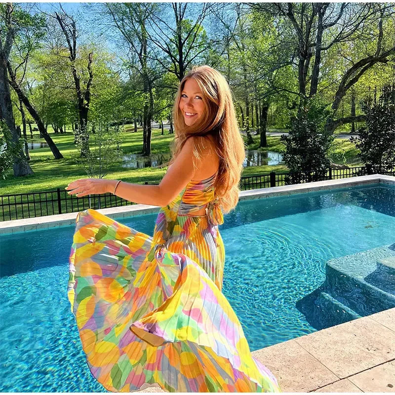 Bedrucktes Sommerkleid mit tiefem Ausschnitt und Schleifendetail – Vivienne