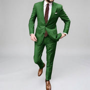 Zweiteiliger Herrenanzug – Blazer und Hose, klassisch-formeller, maßgeschneiderter Stil – Grün