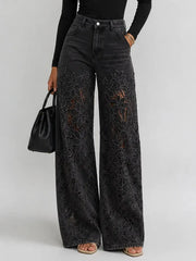 Kaliora - Wide-Leg-Jeans mit floraler Spitze – Schwarz