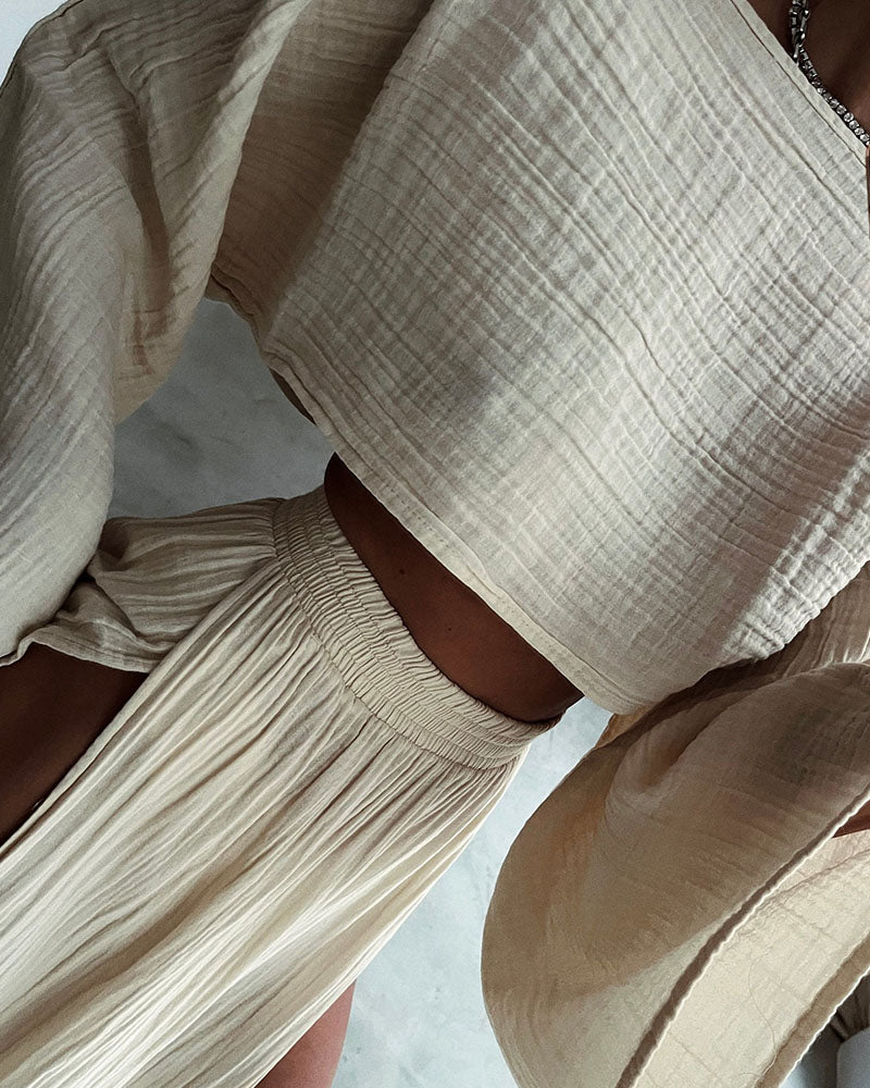 Damen Leinen Zwei-Teiler mit kurzem Oberteil und Rock mit hohem Schlitz