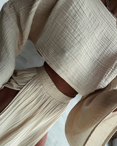 Damen Leinen Zwei-Teiler mit kurzem Oberteil und Rock mit hohem Schlitz