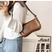 Amal - Handtasche mit gewellter Klappe – Braun