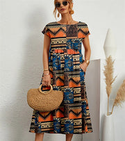 Clara | Leichtes Kleid mit elegantem Blumenmuster – Orange