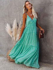 Lyra – Maxikleid mit Blumenmuster, Spaghettiträgern und Stufenrock – Türkis