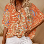 Noellise - künstlerische Bluse mit Fledermausärmeln – Orange